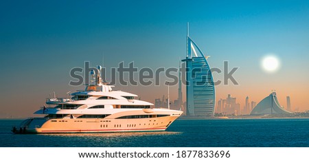 Dubai city center skyline and famous Jumeirah beach in the morning, United Arab Emirates