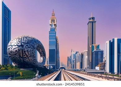 Dubai cityscape, modern metro railway with skyscrapers, sunset. Traffic, Museum of Future with urban skyline background of city UAE. - Powered by Shutterstock