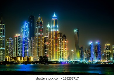 Dubai Downtown Night Scene With City Lights, Luxury New High Tech Town In Middle East, United Arab Emirates Architecture