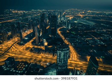 Dubai Downtown Night Scene With City Lights. Top View From Above