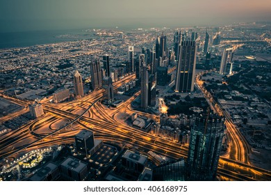 Dubai Downtown Night Scene With City Lights. Top View From Above