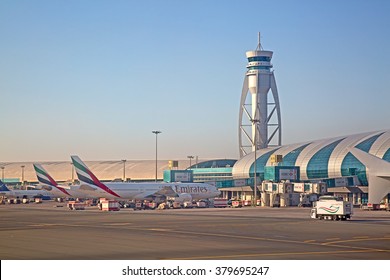 Dubai - February 20:  Planes preparing for take off at Dubai Airport on February 20, 2016 in Dubai, U.A.E. Dubai airport is home port for Emirates Airlines and one of the biggest world hubs.