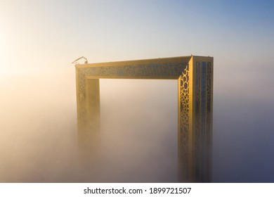 Dubai frame covered in dense fog during sunrise
