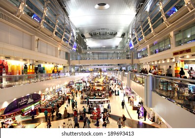 DUBAI INTERNATIONAL AIRPORT, DUBAI-JULY 25: Dubai International Airport with glorious duty free section on July 25, 2013. Dubai International is one of the fastest growing major hubs