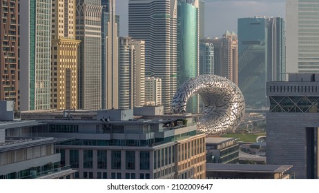 Dubai International Financial district aerial morning timelapse. Close up view of business and financial office towers. Skyscrapers with hotels and museum near downtown