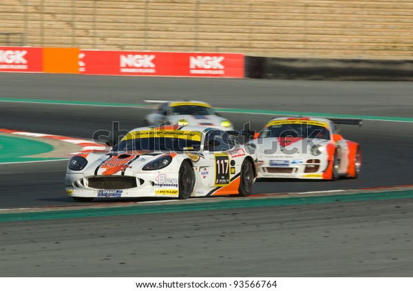 DUBAI - JANUARY 13: Car 117, a Ginetta G50,\
participating in the 2012 Dunlop 24 Hour Race at Dubai Autodrome on\
January 13, 2012.