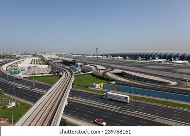 DUBAI - JUNE 20: An overview of Dubai Internation Airport termonal and ramp as seen on June 20, 2014. Dubai International Airport is one of the largest passenger hubs in middle east.