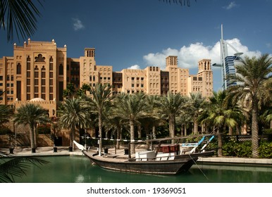 Dubai, Madinat Jumeirah Park With The Artificial Lake And The Boat