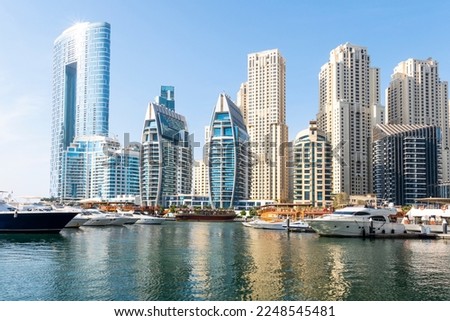 Dubai Marina skyscrapers, port with luxury yachts and Marina promenade, Dubai United Arab Emirates