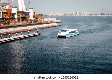 Dubai Marina, Dubai / United Arab Emirates / 11 19 2019:  Dubai water taxi from the RTA passing by Blue Waters Island
