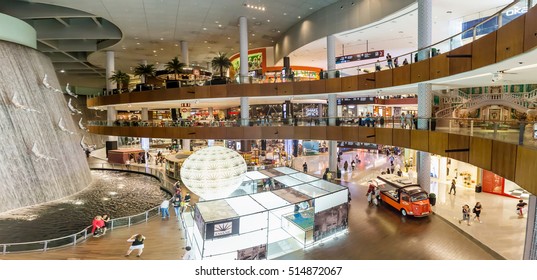 DUBAI - NOVEMBER 08, 2016: Waterfall in Dubai Mall. The Dubai Mall linterior. The Dubai Mall located in Dubai, it is part of the 20-billion-dollar Downtown Dubai complex, and includes 1,200 shops.