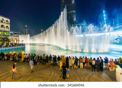 DUBAI - OCT 15: The Dubai Fountain on October 15, 2014 in Dubai, UAE. The Dubai Fountain is the world's largest choreographed fountain system set on the 30-acre manmade Burj Khalifa Lake