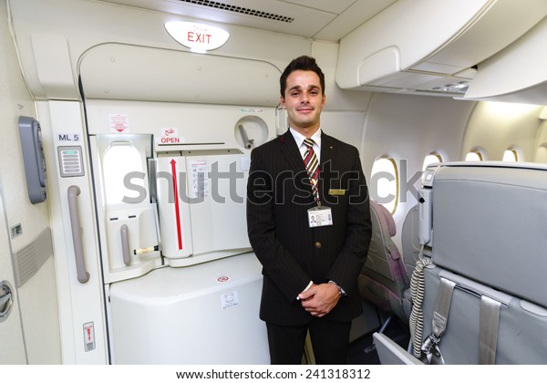 DUBAI -\
OCT 17: Emirates crew member in Airbus A380 aircraft on October 17,\
2014 in Dubai, UAE. Emirates handles major part of passenger\
traffic and aircraft movements at the\
airport.