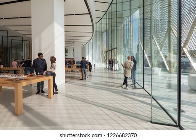 DUBAI - OCTOBER, 2018: Customer Looking At New Products Inside Apple Store.