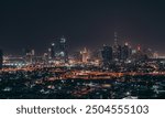 Dubai Skyline, A night shot of Dubai skyline and shimmers of Burj Khalifa