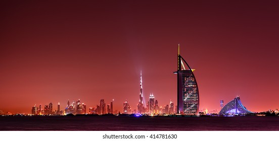 Dubai skyline reflection at amazing night, Dubai, United Arab Emirates