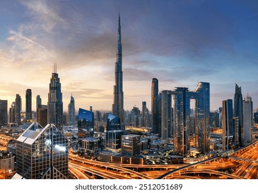 Dubai skyline at sunset with Burj Khalifa - aerial view, United Arab Emirates - Powered by Shutterstock