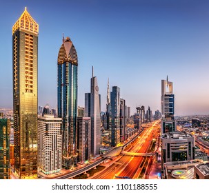 Dubai Sunset Panoramic View Of Burj Khalifa With Sheike Zayed Road. Dubai Is Super Modern City Of UAE, Cosmopolitan Megalopolis.