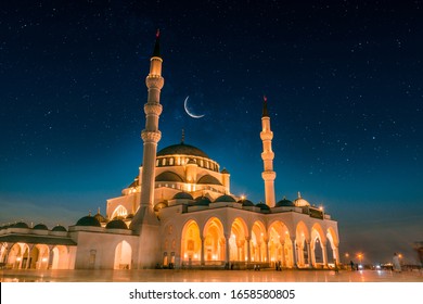 Dubai Tourism and Travel Spot Sharjah New Grand Mosque second largest mosque in Middle east, Beautiful night view of mosque with stars and moon, Amazing Islamic architecture design 