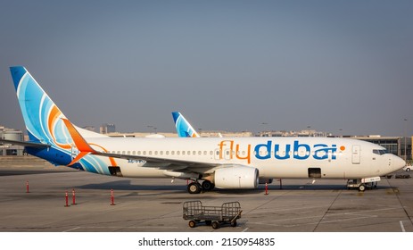 Dubai, UAE, 05.11.21. Flydubai low-cost airline Boeing 737-800 NG parked on apron at Dubai International Airport DXB before departure.