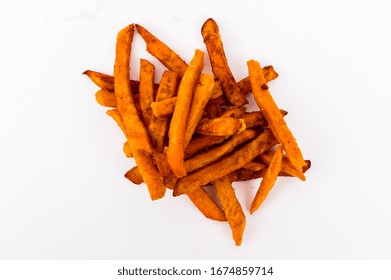 DUBAI / UAE - 07 05 2018: French Fries Isolated On White, Deep Fried Healthy Fast Food Tasty, Hangover Food Sweet Potato Fries