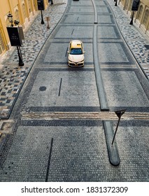 Dubai, UAE - 09.10.2020: Paving Road At JBR Walk With Yellow Taxi, High Angle View