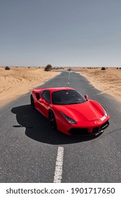 DUBAI  UAE - 11-12-2020: Ferrari 488 On A Desert Road Near Dubai. Red Ferrari, Soft Top Car Sports Car Exotic