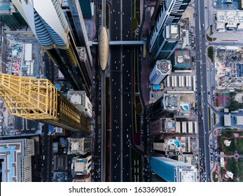 Dubai, UAE - 13 April, 2018: Aerial shot of birds eye view of Sheikh Zayed Road with high rise buildings on both sides in Dubai, UAE