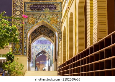 Dubai, UAE, 24.09.21. The Iranian Mosque (Imam Hussein Mosque) In Dubai, Entrance Hall With Colorful Tiles Facade, Example Of Persian Architecture And A Shoe Rack, Night View.