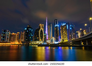 Dubai, UAE, 5 January 2022: Beautiful View Of Dubai City Skyscrapers Or Towers Along With Burj Khalifa At Night. Long Exposure Shot.