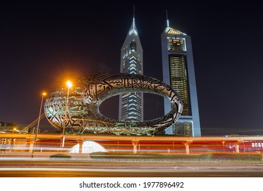 DUBAI, UAE - APRIL 17, 2021: View Side Museum Of The Future In Night, Sheikh Zayed Road, Jumeirah Emirates Towers Hotel