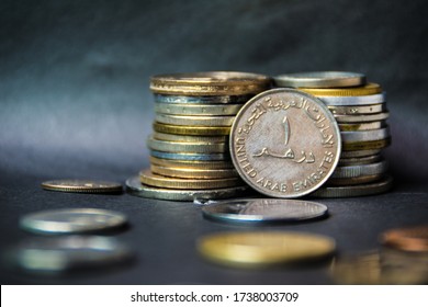 Dubai, UAE - April 18, 2020: Coins On UAE (AED) Taken With Low Light And Dark Background.