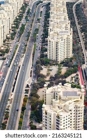 Dubai, UAE - April 18, 2022: Palm Jumeirah, Shoreline Apartments Road And Moving Cars.