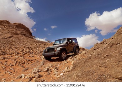 Dubai, UAE - APRIL 24, 2018: Jeep Wrangler Offroad Adventure In The Red Desert Of Dubai On The Rock Dunes