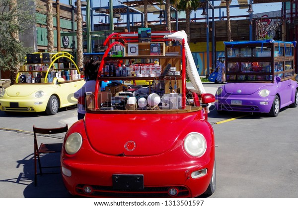 Dubai, UAE, dated 8th of Feb 19. Ephemeral\
shops in a tourist location. Old cars have been transformed into\
small shops that are easy to move. Creativity is the key factor\
driving development.