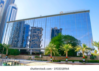 Dubai - UAE - December 18, 2020: Canadian Thomson Reuters Corp. buildings in Dubai. Worldwide famous media company headquarter exterior in park.
