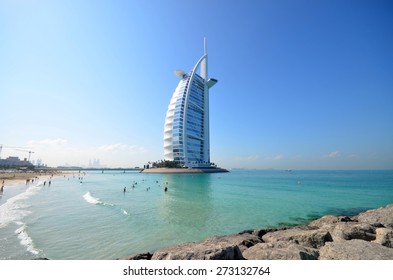DUBAI, UAE - DECEMBER 26, 2014: Burj Al Arab in Dubai, as seen on December 26, 2014. It is a 7-star hotel built on an artificial island and is the fourth tallest hotel in the world.