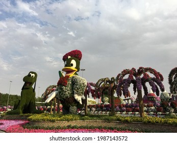 Dubai - UAE, February 11, 2020: Low Angle View Of Huge Louie Duck Statue Made Of Green Grass In Dubai Miracle Garden.