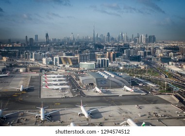 DUBAI, UAE- FEBRUARY, 2018: Aerial View Over Dubai Airport With The City Skyline In The Background