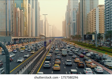 Dubai, UAE - February 2020 : Rush Hour With Many Cars. Traffic Jam In Dubai Downtown City Road Among Skyscrapers.