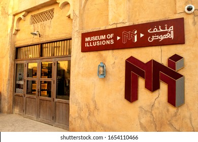 Dubai / UAE - February 21, 2020 : Logo Sign Of Museum Of Illusions On Old Outdoor Wall In Al Seef Dubai Area. 