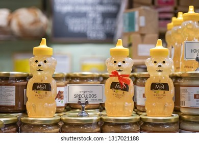 Dubai, UAE - Jan 1, 2019 : A photo of Organic Acacia Honey Bear on display at shopping mall. Acacia honey in a traditional honey bear - from Hungary Excellent taste in plastic bear bottle.