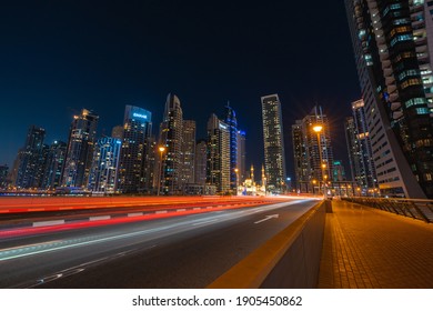 Dubai U.A.E, January 29, 2021. Dubai Marina Night life, playing with light trails of cars passing by.