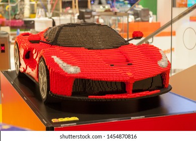 Dubai, UAE - July 2 2019 : Huge Ferrari car made up of legos and displayed in the shopping mall. Big Lego Ferrari Car. 