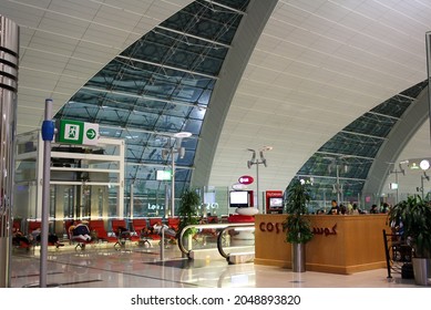 Dubai, UAE - Jun 2010: Interior Of Dubai International Airport Terminal At Night. No People.