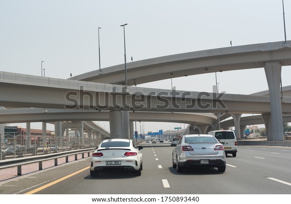 Dubai, UAE, June 3, 2020.  Sheikh Zayed Road - highway\
in Dubai. Bridges and exits. Traffic in UAE. Best roads in the\
world 