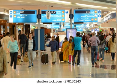 DUBAI, UAE - MARCH 10, 2015: DXB airport interior. Dubai International Airport is an international airport serving Dubai. It is a major airline hub in the Middle East, and is the main airport of Dubai