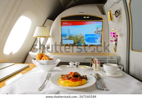 DUBAI, UAE - MARCH\
31, 2015: Emirates Airbus A380 interior. Emirates is one of two\
flag carriers of the United Arab Emirates along with Etihad Airways\
and is based in Dubai.
