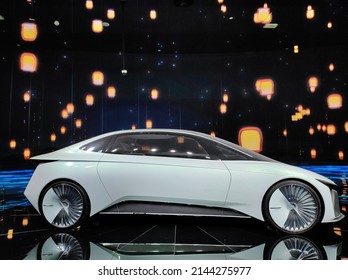 Dubai, UAE- March 31 2022: A Futuristic Model Of An Electric Car Displayed At An Auto Expo In Shanghai And Dubai.