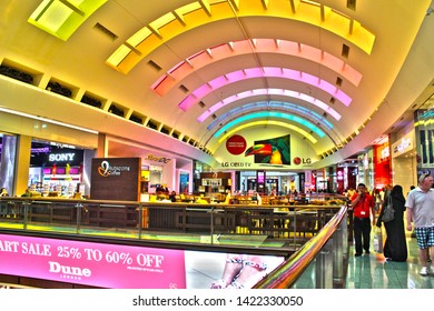 DUBAI, UAE - MAY 02, 2016: Colorful view inside the Dubai Mall with advertising and people